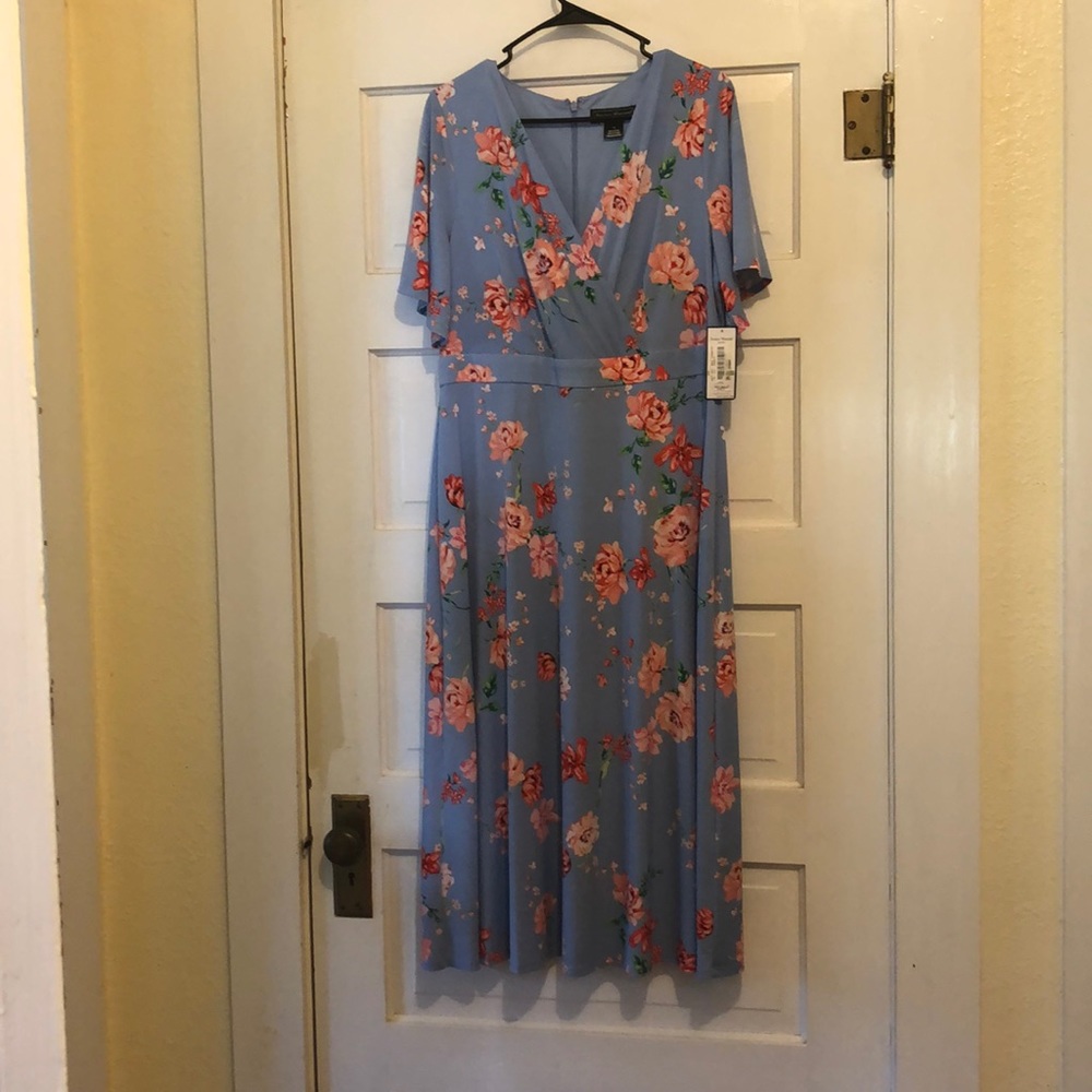 Never worn!! Flowery dress!! With tags!!
